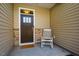 Cozy front porch with a rocking chair creates a welcoming entrance to the home at 1101 Compass Dr, Durham, NC 27713