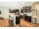 Modern kitchen featuring an island with seating and stainless steel appliances at 1101 Compass Dr, Durham, NC 27713