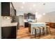 Stylish kitchen with dark cabinets, light countertops, and ample seating at 1101 Compass Dr, Durham, NC 27713