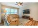 Inviting living room with a comfortable seating area and large windows at 1101 Compass Dr, Durham, NC 27713