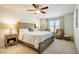 Spacious main bedroom offers a ceiling fan and a window for plenty of natural light at 1101 Compass Dr, Durham, NC 27713