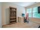 This office features a computer and pink chair, with natural light streaming through the window, creating an inviting workspace at 1101 Compass Dr, Durham, NC 27713