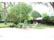 Inviting backyard with a stone fire pit and seating area, perfect for gatherings at 1111 College St, Oxford, NC 27565
