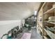 A basement with a dedicated workout area, equipped with free weights, and a weight rack at 1111 College St, Oxford, NC 27565