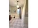 Spacious bathroom with checkered floor tiles, a window with blinds, and a shower with a curtain at 1111 College St, Oxford, NC 27565