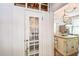 Charming kitchen featuring an island and decorative glass pantry door at 1111 College St, Oxford, NC 27565