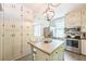 Bright kitchen with ample storage, island seating and modern appliances at 1111 College St, Oxford, NC 27565