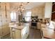 Bright eat-in kitchen with stainless steel appliances, ample storage and center island at 1111 College St, Oxford, NC 27565