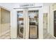 Functional laundry room with modern stainless steel appliances and ample storage space at 1111 College St, Oxford, NC 27565