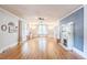 Spacious living room with hardwood floors, fireplace, and ample natural light at 1111 College St, Oxford, NC 27565