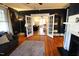 Inviting living room with fireplace, hardwood floors and plenty of space at 1111 College St, Oxford, NC 27565