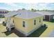 Rear exterior with new siding, patio, and a modern architectural style at 116 Laurel Ave, Durham, NC 27701