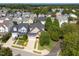 Beautiful aerial view of a neighborhood showcasing well-maintained homes and lush landscaping at 121 Bridgegate Dr, Cary, NC 27519