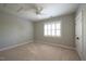Spacious bedroom with a window with window blinds, plush carpet and neutral paint at 121 Bridgegate Dr, Cary, NC 27519