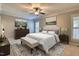 Comfortable main bedroom with king bed, plush bedding, and decorative furnishings at 121 Bridgegate Dr, Cary, NC 27519