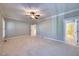 Spacious main bedroom features neutral carpet, walk-in closet, and ample natural light at 121 Bridgegate Dr, Cary, NC 27519