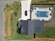 Stunning aerial view of property, showcasing pool, patio, backyard, long driveway, and landscaping at 1302 Reading Ct, Burlington, NC 27217