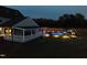 Expansive backyard with screened porch, in-ground pool, patio, and privacy fence at 1302 Reading Ct, Burlington, NC 27217