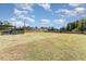 Large backyard featuring a well-manicured lawn, a fence, and ample space for outdoor enjoyment at 1302 Reading Ct, Burlington, NC 27217