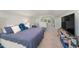 Large bedroom features soft decor, a plush bed, and a ceiling fan for added comfort at 1302 Reading Ct, Burlington, NC 27217