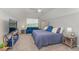 Spacious bedroom featuring a comfortable bed, a bright window, and tasteful decor at 1302 Reading Ct, Burlington, NC 27217
