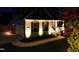 Inviting front exterior with well-maintained lawn and front porch lighting at 1302 Reading Ct, Burlington, NC 27217