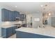 A partial view of the kitchen showing the countertop, sink, and subway tile backsplash at 1302 Reading Ct, Burlington, NC 27217