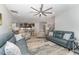 A view of the living room as it connects to the kitchen featuring modern design and attractive flooring at 1302 Reading Ct, Burlington, NC 27217