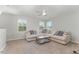 Cozy loft area with large sectional sofa and lots of natural light at 1302 Reading Ct, Burlington, NC 27217