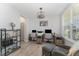 Spacious home office with modern desks, comfortable seating, and stylish decor for a productive workspace at 1302 Reading Ct, Burlington, NC 27217