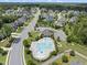 Community aerial view of neighborhood featuring clubhouse, pool, playground, and residential streets at 1308 Mackinaw Dr, Wake Forest, NC 27587