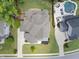 Aerial view of a home with an in-ground pool, patio with furniture, and manicured landscaping at 1308 Mackinaw Dr, Wake Forest, NC 27587