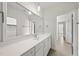 Stylish bathroom featuring a large vanity, modern mirror, and contemporary fixtures at 1308 Mackinaw Dr, Wake Forest, NC 27587