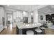 Spacious kitchen with stainless appliances, granite countertops, and a large island with seating at 1308 Mackinaw Dr, Wake Forest, NC 27587