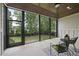 Relaxing screened porch with wood ceiling, ceiling fan, and a view of backyard at 1308 Mackinaw Dr, Wake Forest, NC 27587