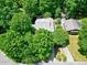 Property aerial view highlights mature tree coverage at 1416 Dunbar Ct, Cary, NC 27511
