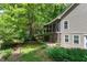 The home features a screened porch and a lovely yard that is beautifully landscaped at 1416 Dunbar Ct, Cary, NC 27511