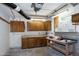 Unfinished basement features work area and storage cabinets at 1416 Dunbar Ct, Cary, NC 27511