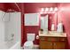 Bathroom with a shower-tub combo, toilet and sink at 1416 Dunbar Ct, Cary, NC 27511