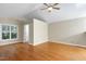 Bedroom with hardwood floors, a ceiling fan, and a window at 1416 Dunbar Ct, Cary, NC 27511