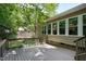 Spacious wooden deck with railing, offering ample outdoor living space and backyard views at 1416 Dunbar Ct, Cary, NC 27511