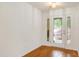 Bright foyer with hardwood floors and a decorative glass-paneled front door at 1416 Dunbar Ct, Cary, NC 27511