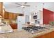 Bright kitchen boasts granite countertops, stainless steel gas range, and ample cabinet space at 1416 Dunbar Ct, Cary, NC 27511