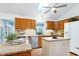 Eat-in kitchen with granite countertops, stainless-steel appliances, and lots of natural light at 1416 Dunbar Ct, Cary, NC 27511