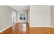 Open living area with hardwood floors and natural light at 1416 Dunbar Ct, Cary, NC 27511