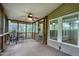Cozy screened porch with wooded views, perfect for outdoor dining and relaxation at 1416 Dunbar Ct, Cary, NC 27511
