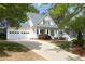 Beautiful home with a spacious driveway and a well-maintained lawn at 1605 Heritage Club Ave, Wake Forest, NC 27587