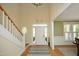Spacious foyer with hardwood floors and staircase at 1605 Heritage Club Ave, Wake Forest, NC 27587