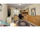 Home office with desk and cabinets, carpeted floor and natural light at 1605 Heritage Club Ave, Wake Forest, NC 27587