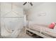 Bright bedroom with a swing, closet, neutral walls, and a decorative sign at 19 Cecina Ct, Clayton, NC 27527